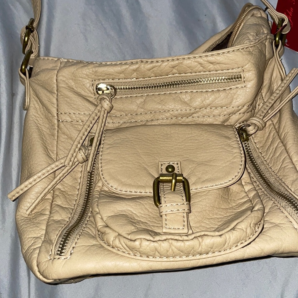 Tan old fashion-liked purse